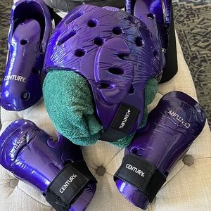 Karate Century Student Sparring Set Headgear, sparring boots, and gloves.